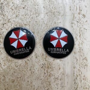 Two Resident Evil Umbrella Corporation Badge Sticker